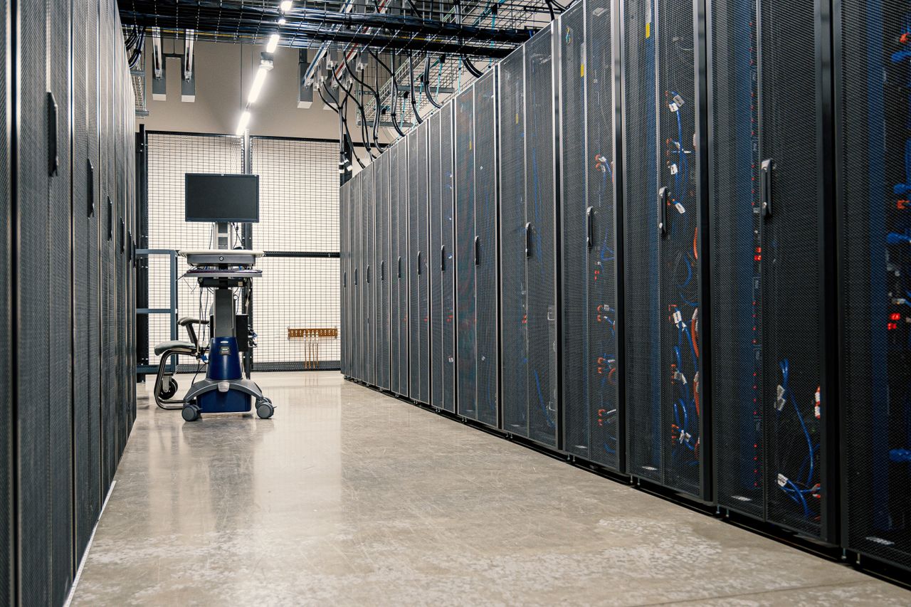 Crafting Captivating Headlines: Your awesome post title goes here Steel framework cabinets housing servers networking devices and cables in contemporary equipped data center